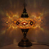 Amber Turkish mosaic table lamp illuminated, showing colorful light projection (ENV MUN3097)