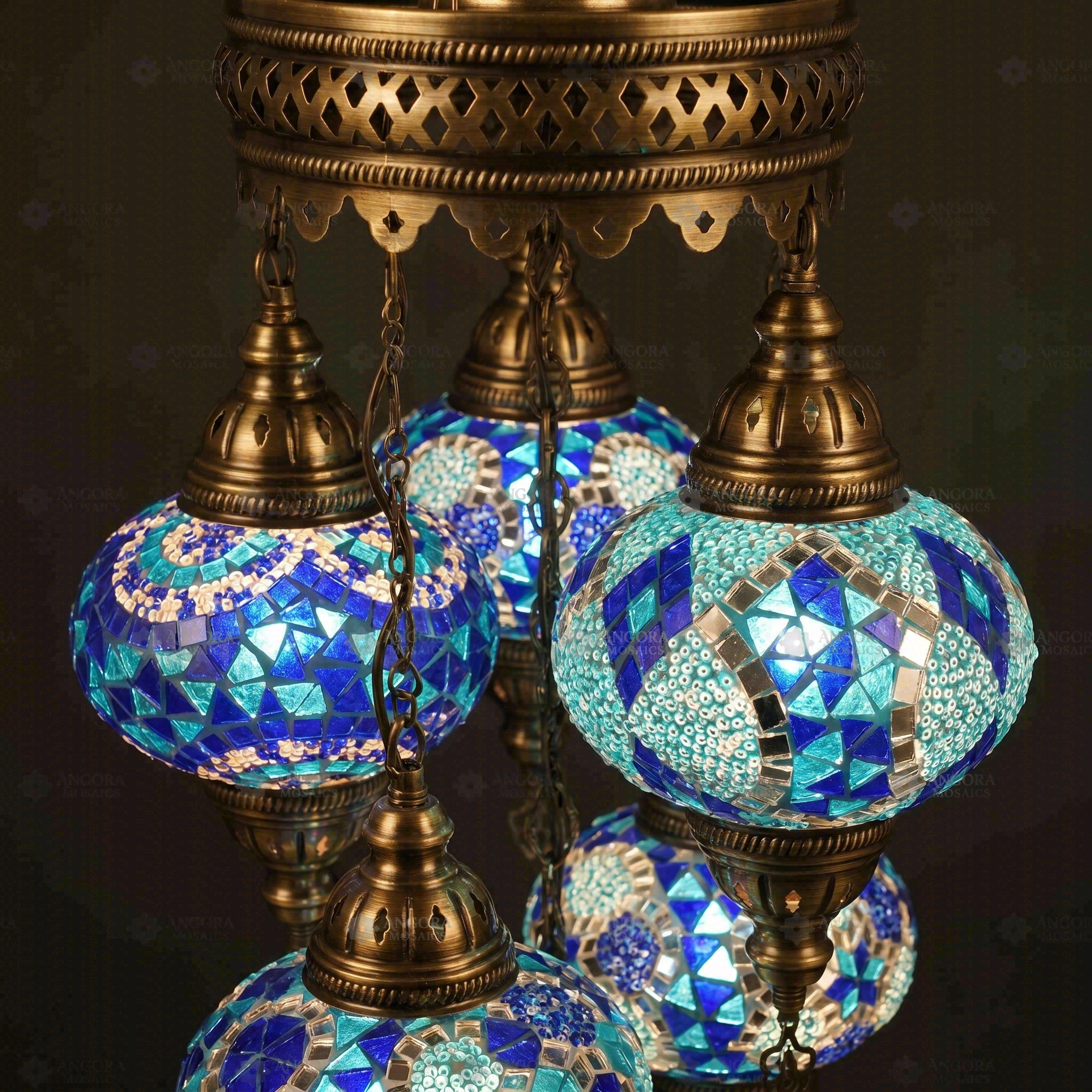 Lit close-up of mosaic glass globe — Blue chandelier glowing (ENV SLT5N3 (05-16-28-32-34))