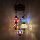 Multicolor Turkish mosaic chandelier illuminated, showing colorful light projection (ENV SLT5N3 (08-18-24-40-43))