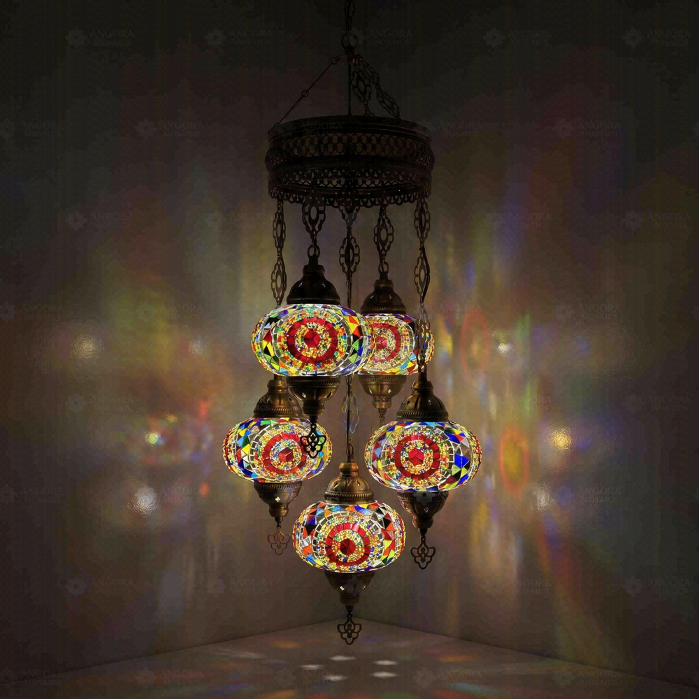 Multicolor 5-Globe Cluster Chandelier, glowing in a dark room