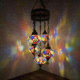Multicolor Turkish mosaic chandelier illuminated, showing colorful light projection (ENV SLT5N3 (3093))