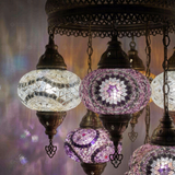 Lit close-up of mosaic glass globe — Cool Tones chandelier glowing (ENV SLT7N3 (12-19-20-36-41-43-64))
