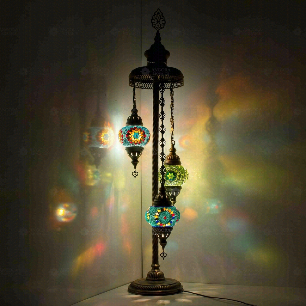 Multicolor 3-Globe Floor Lamp, glowing in a dark room