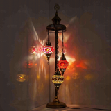 Warm Tones Turkish mosaic floor lamp illuminated, showing colorful light projection (LMD3N3 (08-56-57))