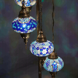Lit close-up of mosaic glass globe — Blue floor lamp glowing (LMD5N3 (05-28-32-34-53))
