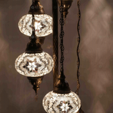 Lit close-up of mosaic glass globe — White floor lamp glowing (LMD5N3 (3015))