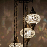 Lit close-up of mosaic glass globe — White floor lamp glowing (LMD5N3 (3022))