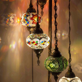Lit close-up of mosaic glass globe — Multicolor floor lamp glowing (LMD7N3 (04-07-14-24-50-96-98))