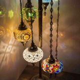 Lit close-up of mosaic glass globe — Multicolor floor lamp glowing (LMD7N3 (06-07-12-26-27-65-96))