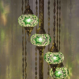 Lit close-up of mosaic glass globe — Green floor lamp glowing (LMD9N3 (3003))